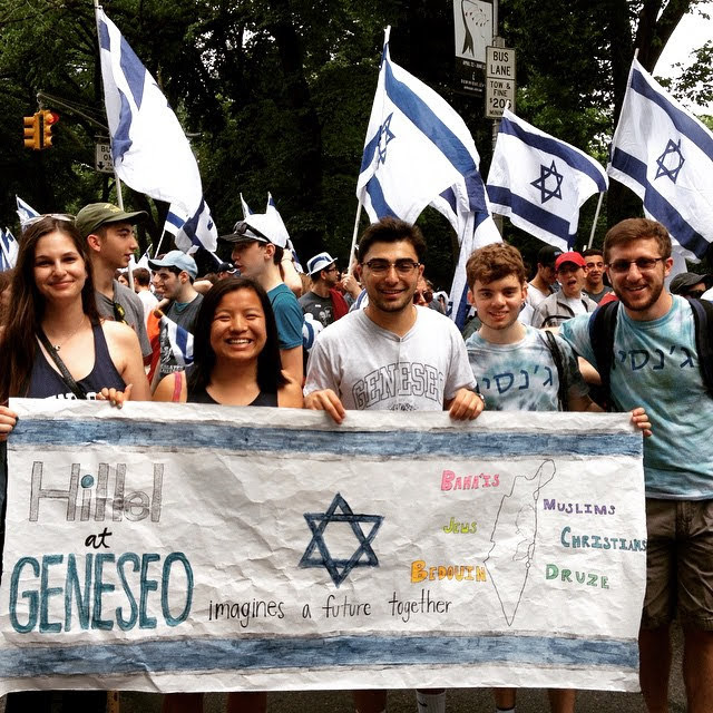 Students with Hillel sign