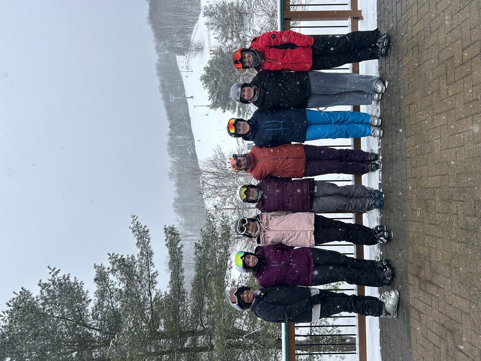 Group of students outdoors in winter wearing ski googles