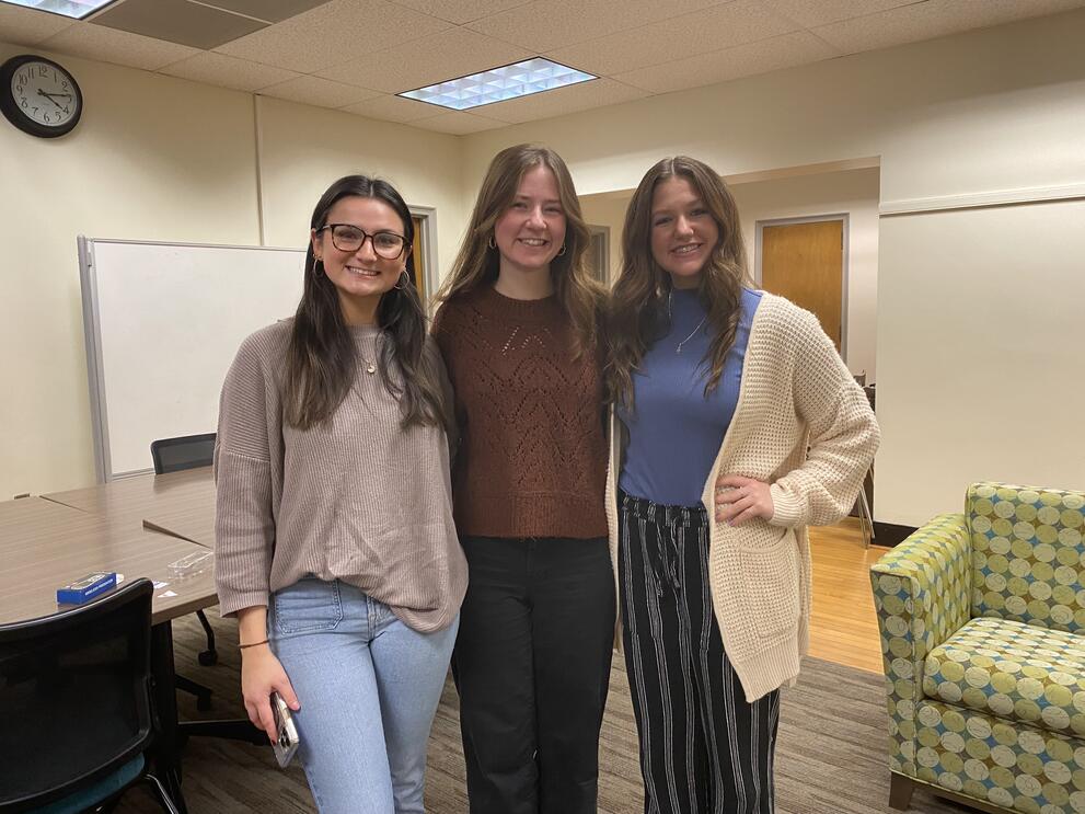 Recent senior WGST students completing Capstone presentations