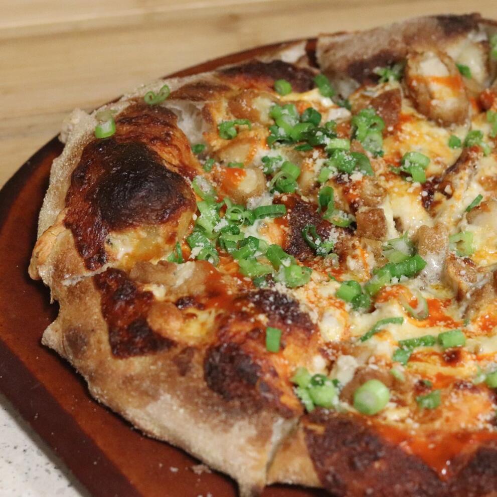 Stone fired Buffalo chicken pizza