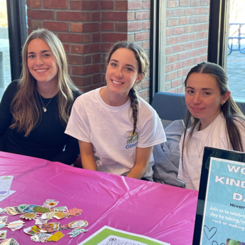 Three students tabling for Healthy Geneseo Team