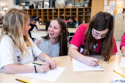 Student teacher with elementary students