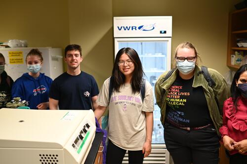 Dr. Jamburuthugoda with research students at Biology Lab Crawl