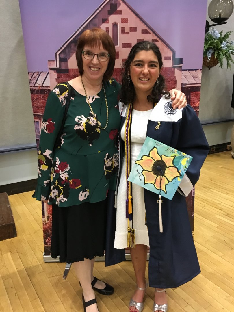 New Geneseo graduate poses with a professor